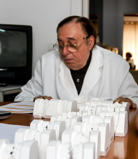 Dr. Cervera Checking Case Studies of Students.